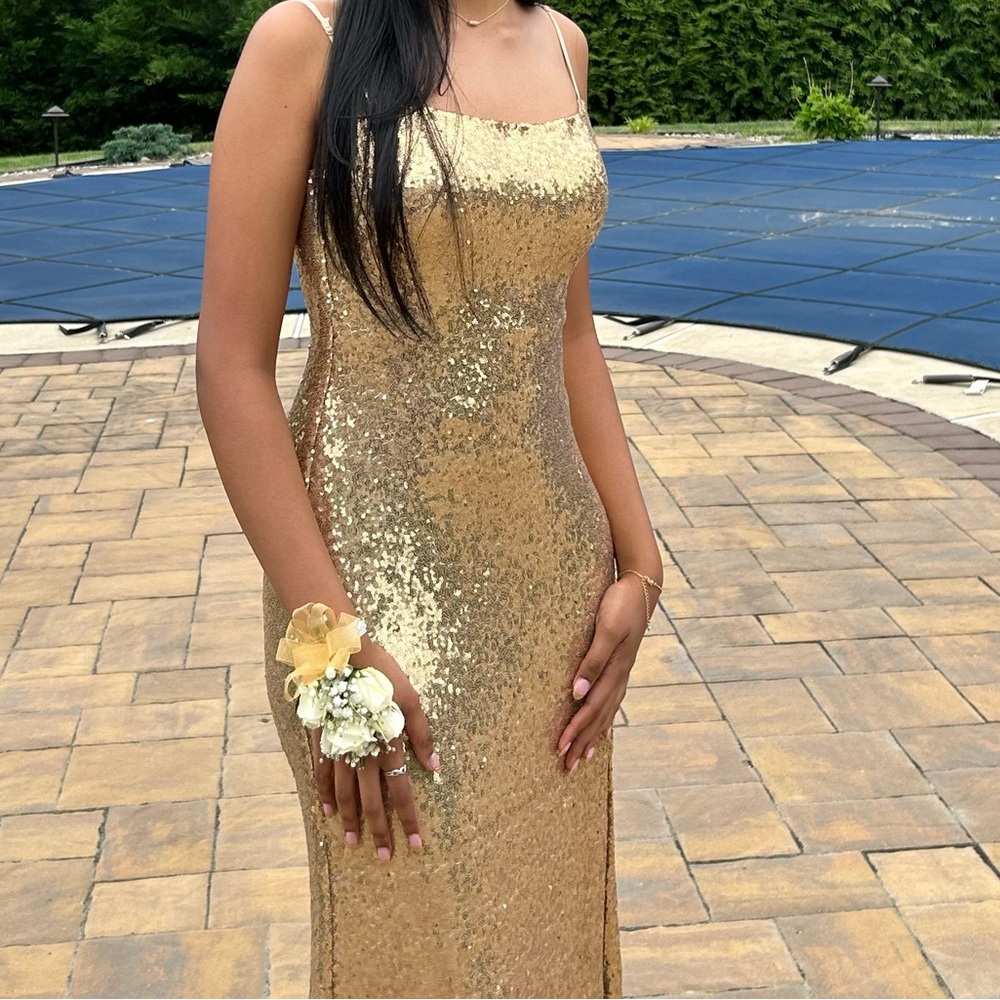 B. Smart gold sequin prom dress with low back
